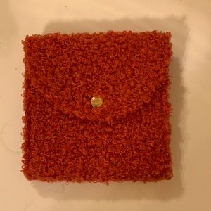 A red purse very preppy